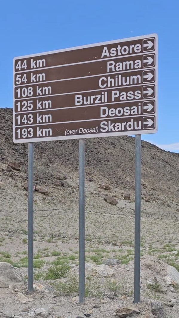 Guidance board on Karakorum highway showing the distances 