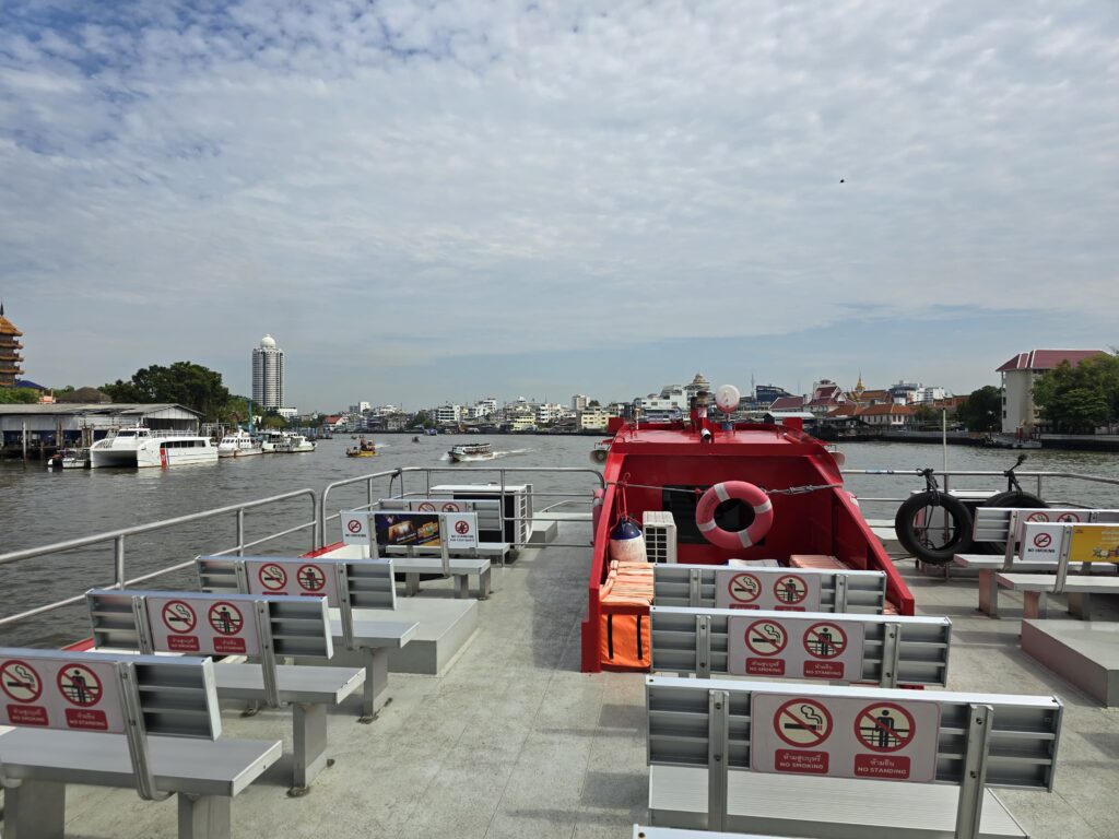 Boat cruising in the Chao Pharaya River of Bangkok