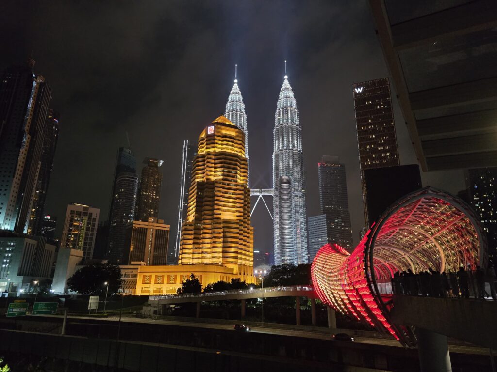 Twin towers can be seen from far away and it even looks beautiful during night