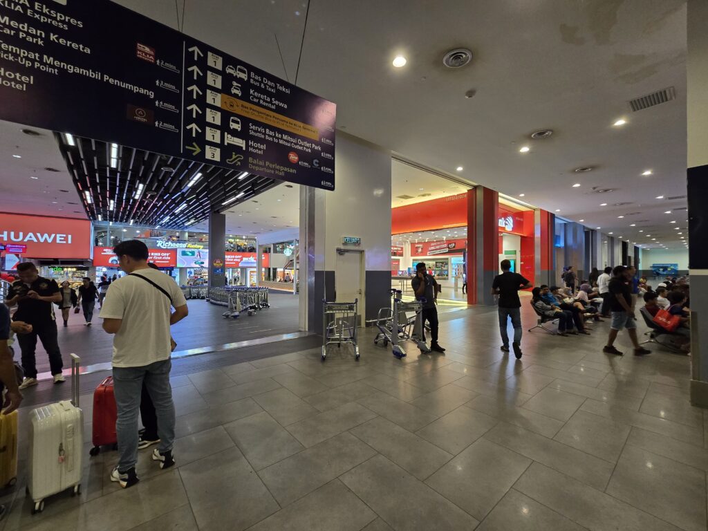 picture is taken at terminal 2 of Kuala Lumpur airport just after security checks, where you will find information about the different facilities of the airport and where they are located