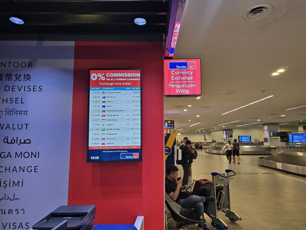 money exchange shop and the rates can be seen in the picture, at Kuala Lumpur airport terminal 2.